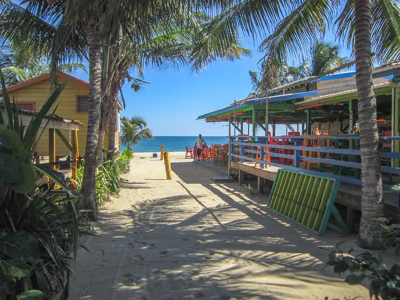 Relax and unwind at a charming beachfront café in Belize.