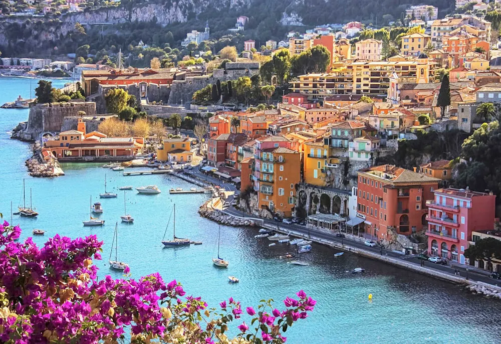 Colorful hillside homes cascade down to the bay in picture-perfect Villefranche-sur-Mer.
