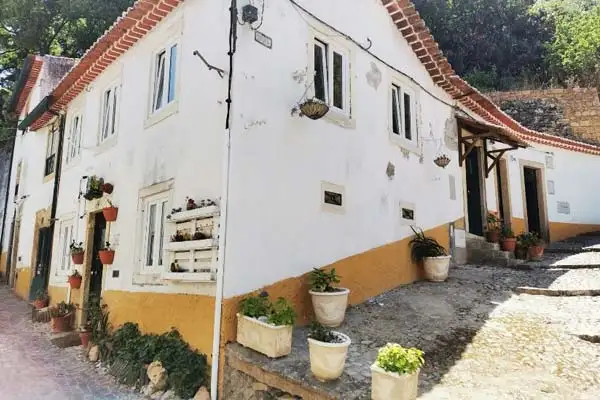 This renovated three-bed lists for €170,000 ($178,671) in Tomar, Portugal.