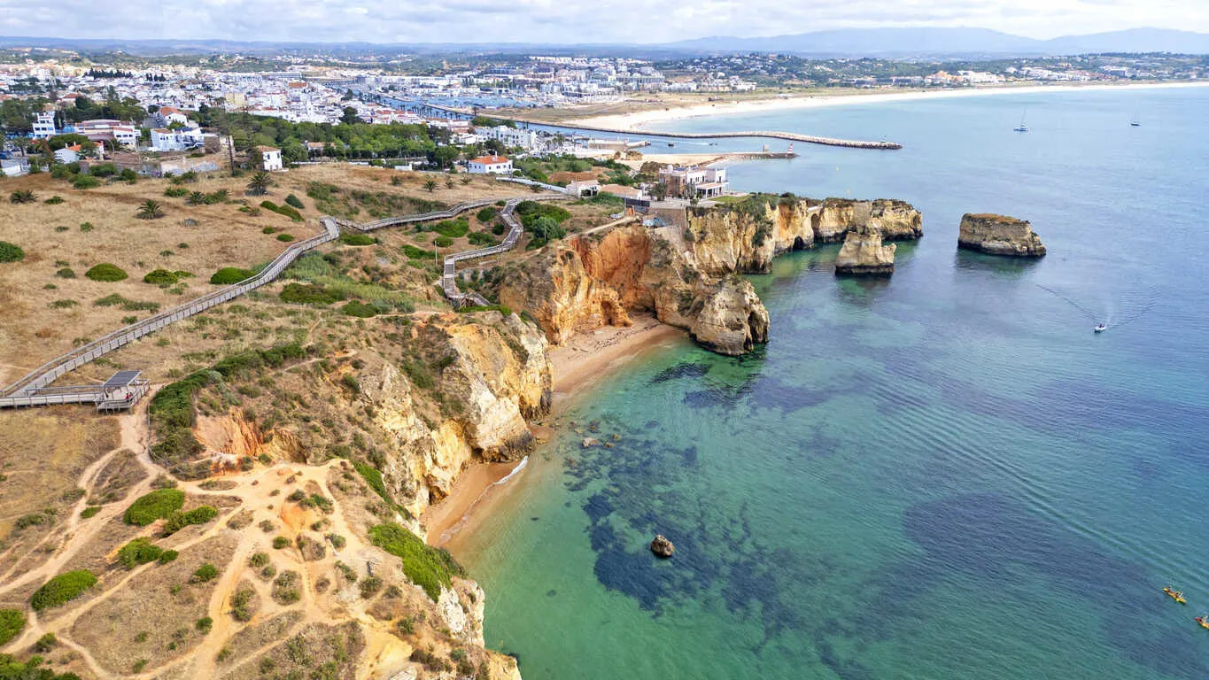 Dramatic rock formations and golden coves make Lagos unforgettable.