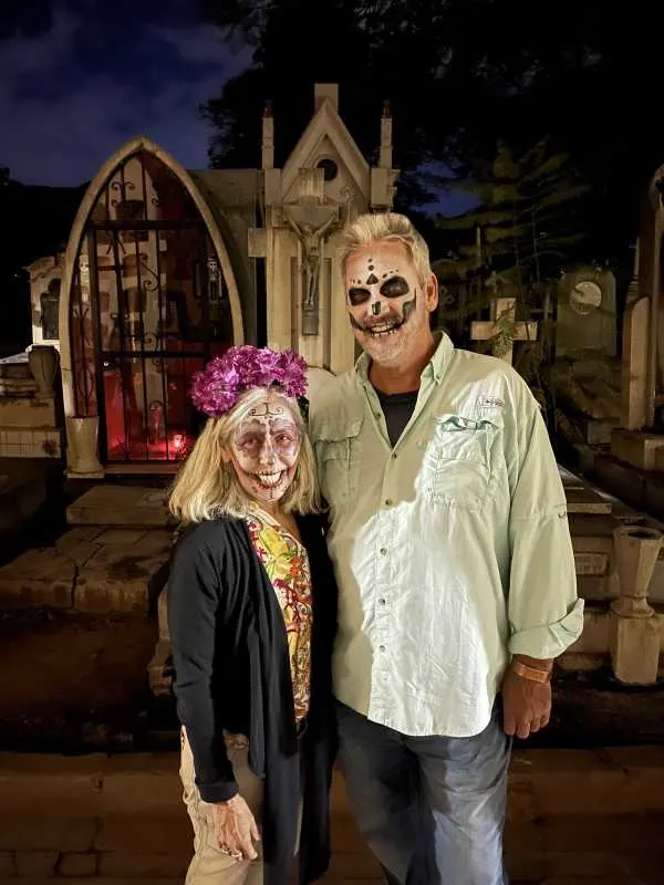 Donna and Gary celebrate Day of the Dead, embracing the rich traditions and colorful face paint.