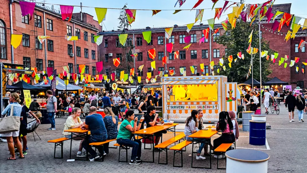 Summer brings vibrant street food festivals, perfect for enjoying Latvia’s mild weather.