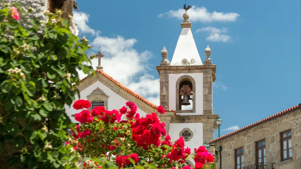 Wander castle walls and dine on duck in this charming village with Renaissance art.