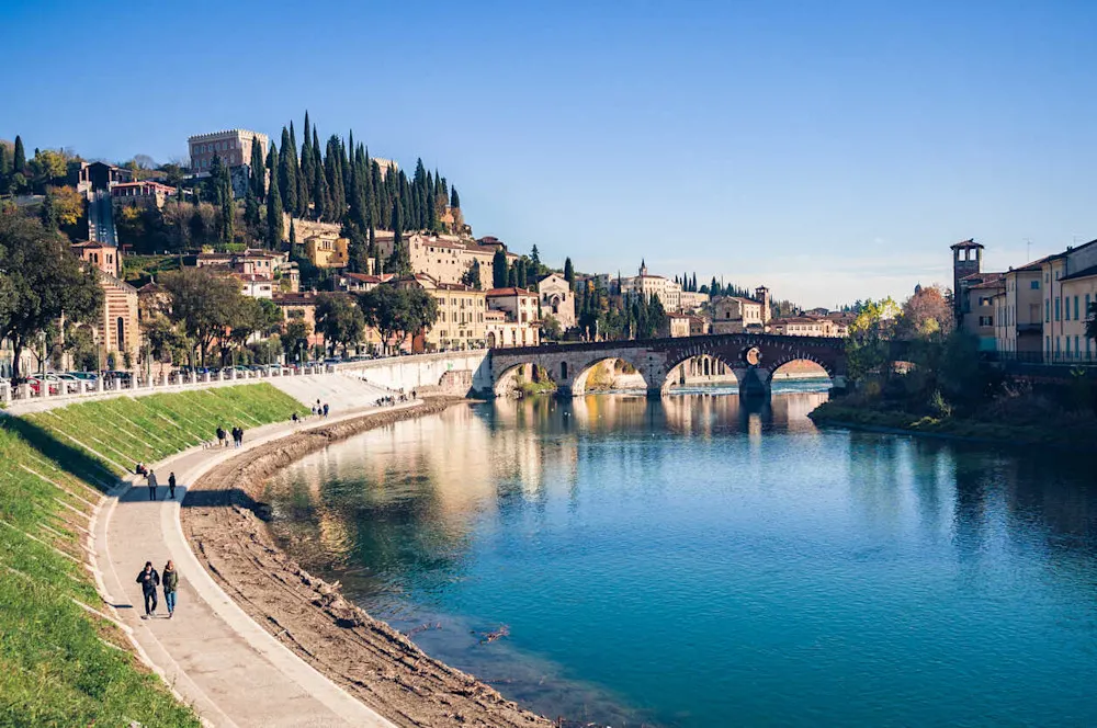 The Adige River winds through Verona’s colorful old town.
