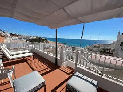 The Millers could never afford such an ocean view back in California, but were able to realize their dream in Albufeira, Portugal.