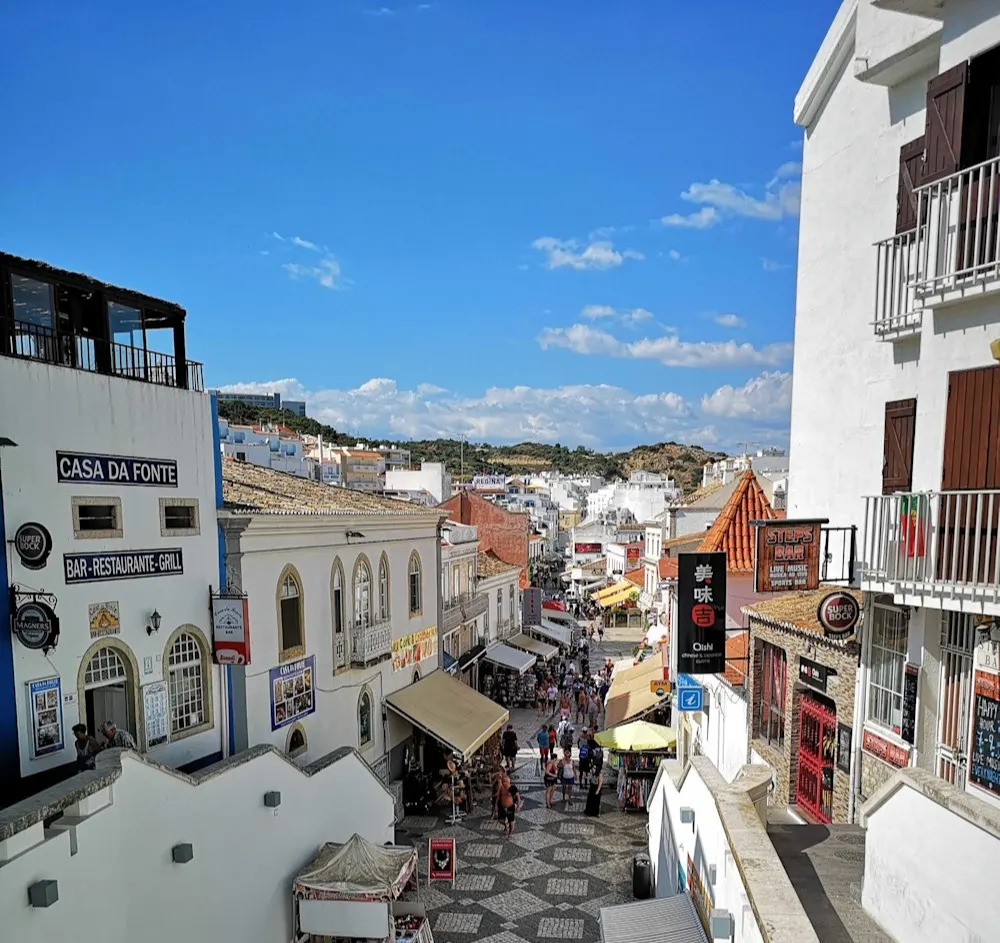 Albufeira’s cobbled streets and lively squares buzz with energy.