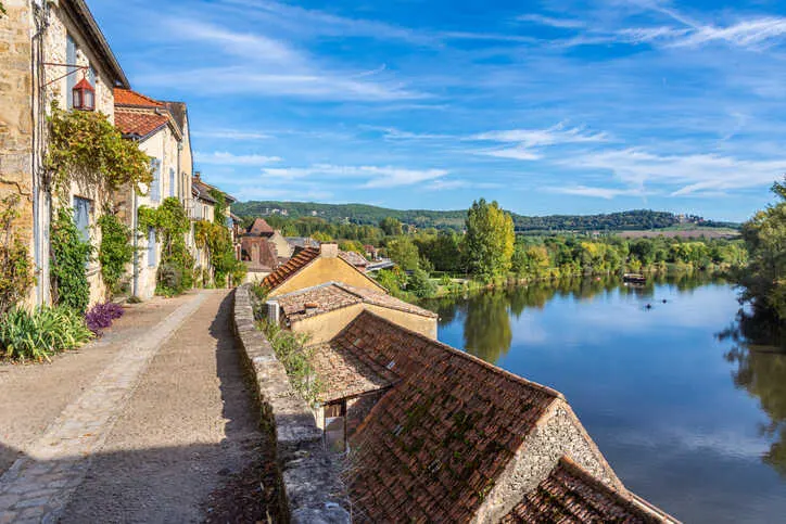 A picturesque village along the serene Dordogne River.