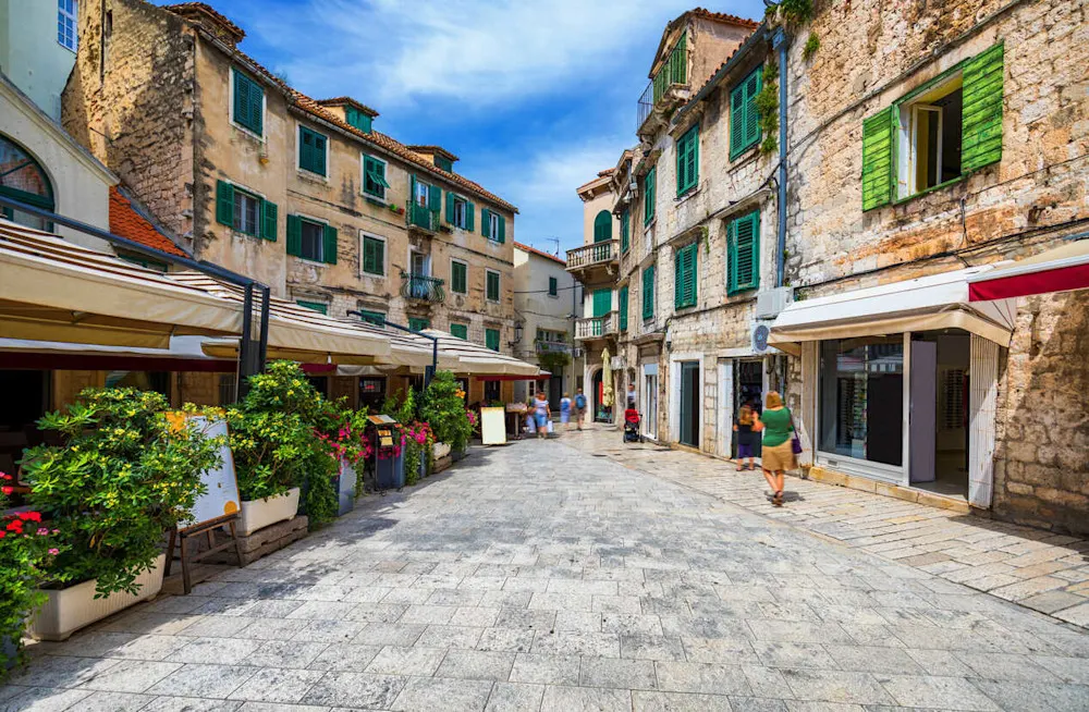 Life slows down in Split’s Old Town, where narrow streets and local cafés invite connection and community.