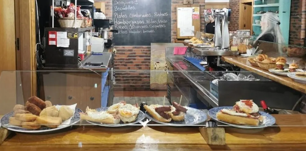 Pintxos and conversation—where a quick bite often turns into a lively chat with locals.