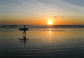 The rippled sands of Playa Guiones are perfect for sunset strolls, bike-rides, and yoga.