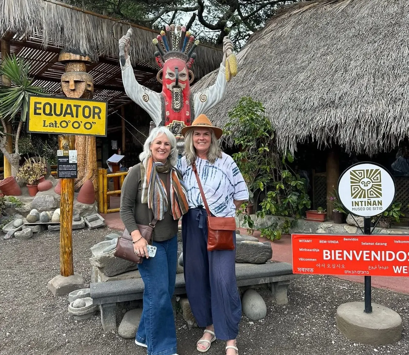 Standing on the middle of the world at the Intiñan Equator Museum.