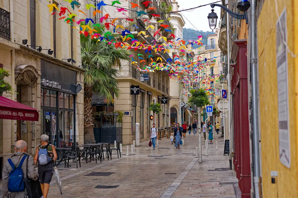 Strolling through Toulon’s charming old town, where historic streets meet lively cafés.