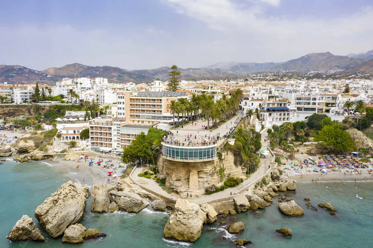Nerja blends Andalusian charm with coves, sea views, and mountain drama.