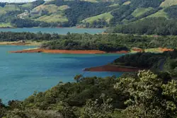 In contrast, you could enjoy life on the emerald green hills that rise above the shores of the Lake Arenal region.