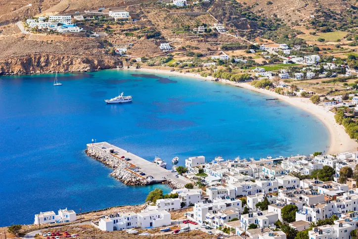 A picturesque view of Aegiali, with its serene bay and whitewashed buildings.