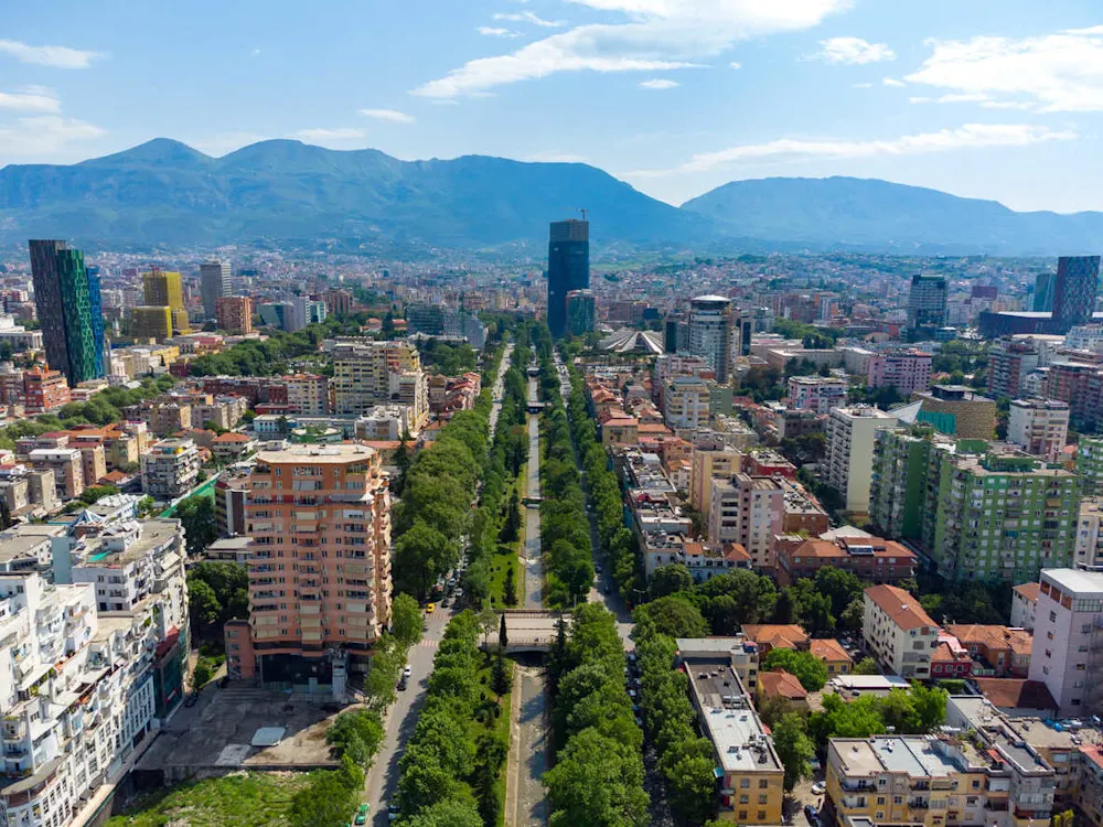 Tirana stays lively year-round, while coastal towns slow down in winter.