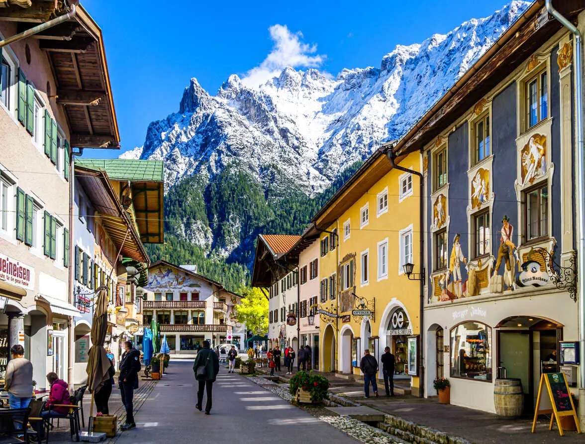 Colorful Lüftmalerei houses and mountain views in charming Mittenwald.
