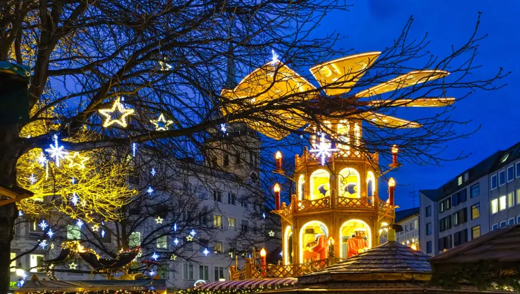 In December, towering trees and Christmas pyramids are added to Germany’s skylines.