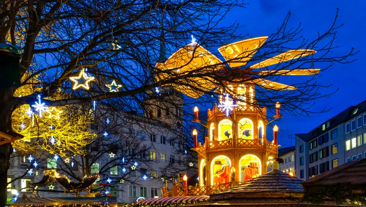 In December, towering trees and Christmas pyramids are added to Germany’s skylines.
