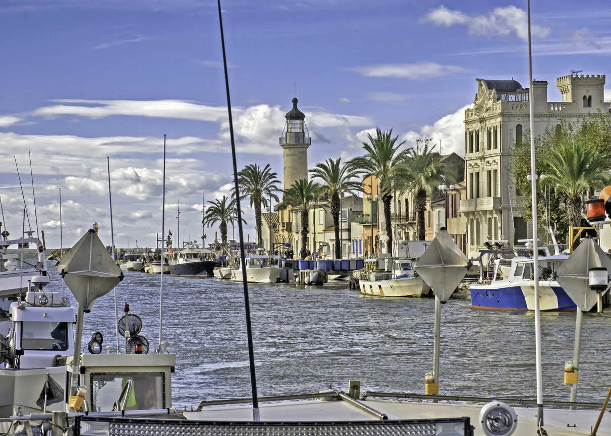 Le Grau du Roi pairs working-town grit with vast dunes and wild beaches.