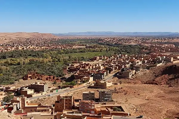 The town of Tinghir, known for its expansive green palmeries, marks the entrance to Morocco’s spectacularly scenic Todra Gorge. ©David Gibb