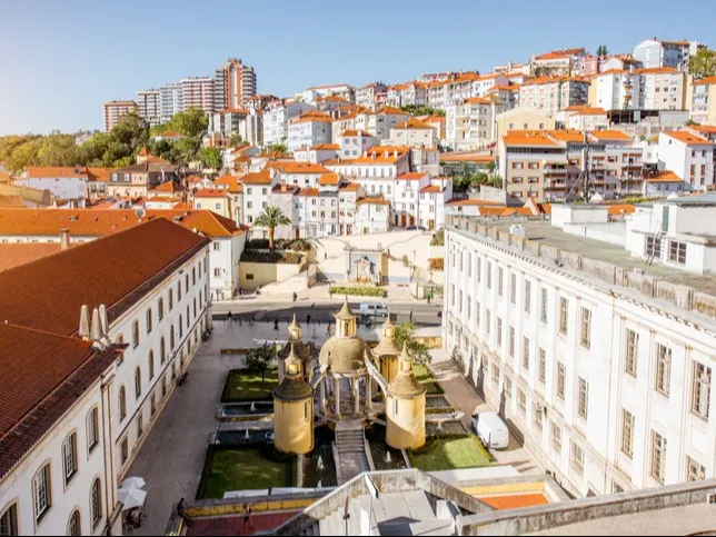 Coimbra's architecture blends Romanesque, Gothic, and Renaissance styles, showcasing Portugal's rich history.