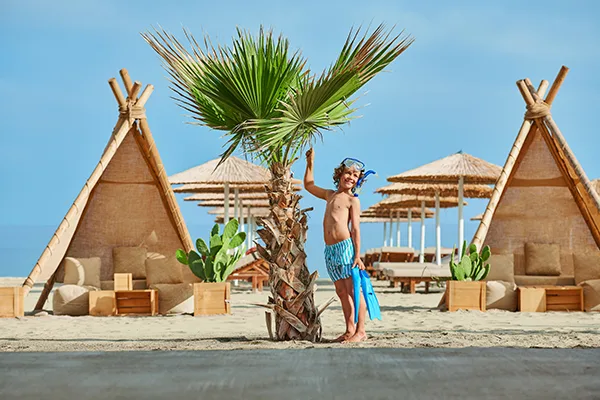 Kid with swimming gear