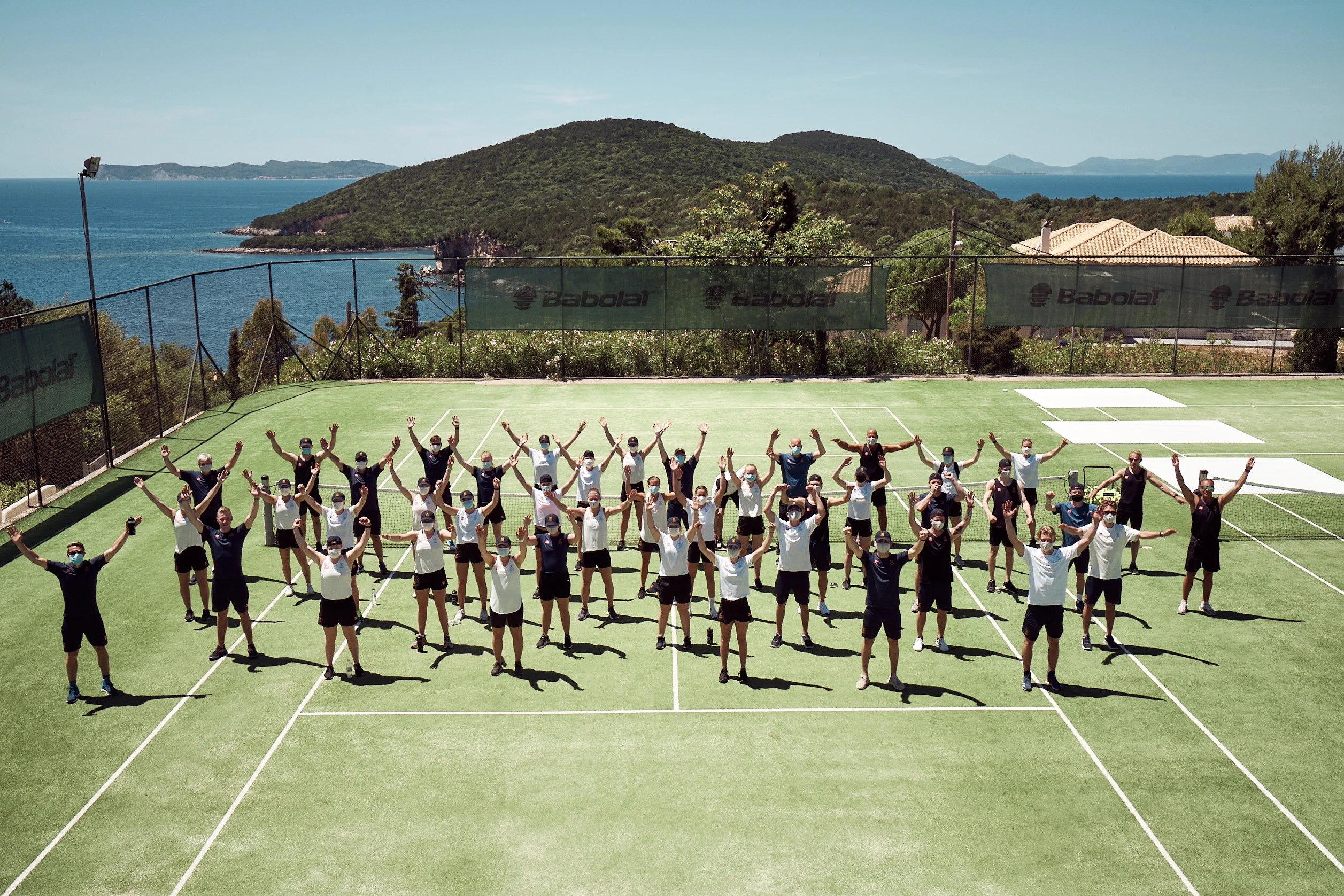 Gruppbild av Sveriges Olympiska Kommitte på träningsläger på Sivoat Retreat - powered by Playitas