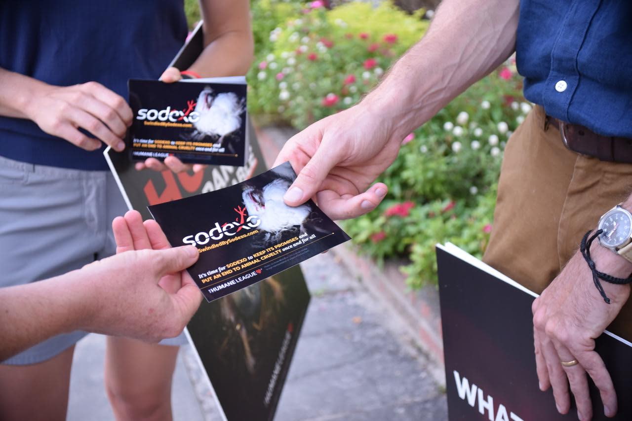 Advocates handing out Sodexo leaflets