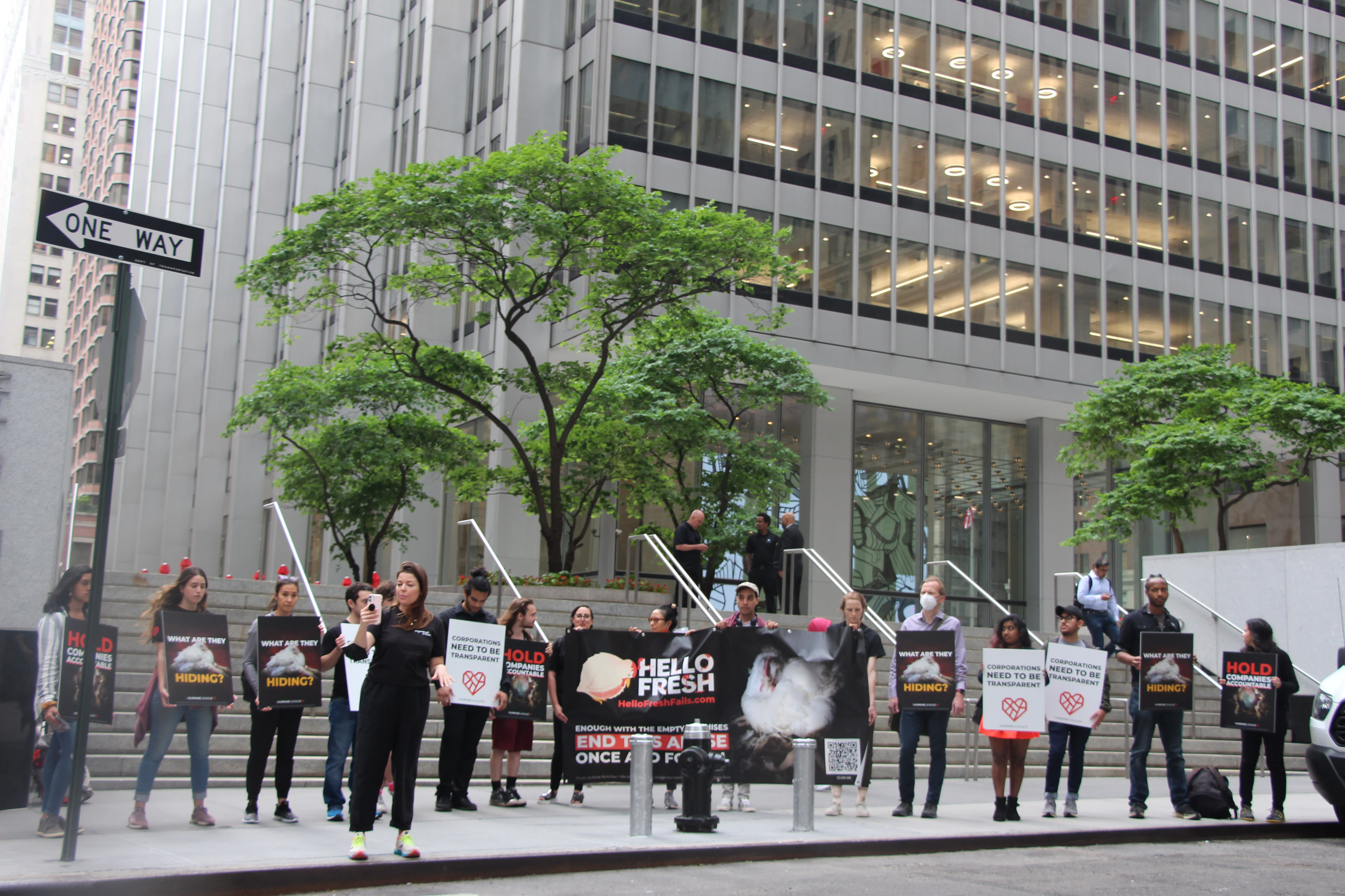 Protesters at at One Chase Manhattan Plaza in New York City, where meal kit company HelloFresh is headquartered on the tenth floor