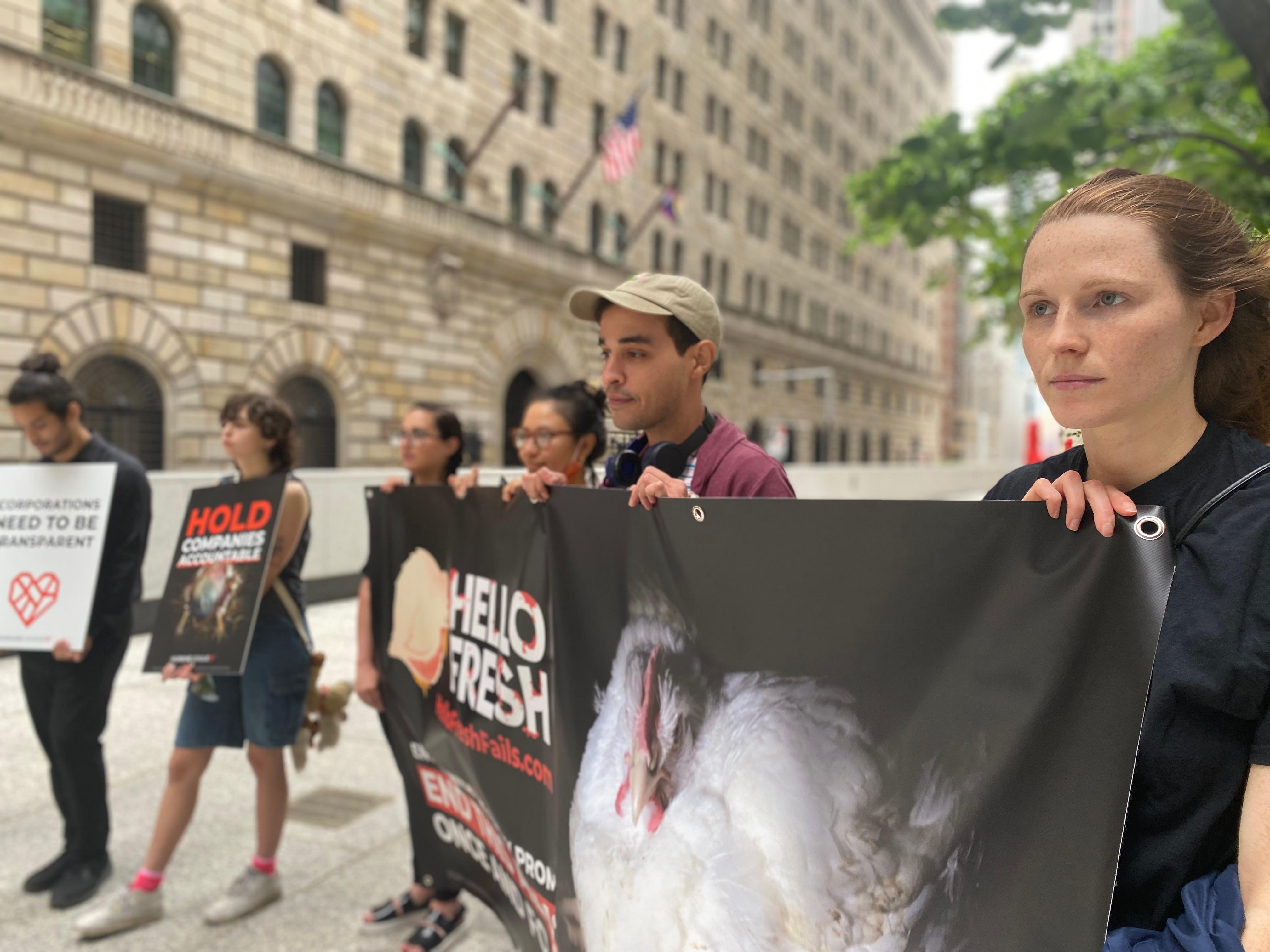 Protesters at at One Chase Manhattan Plaza in New York City, where meal kit company HelloFresh is headquartered on the tenth floor