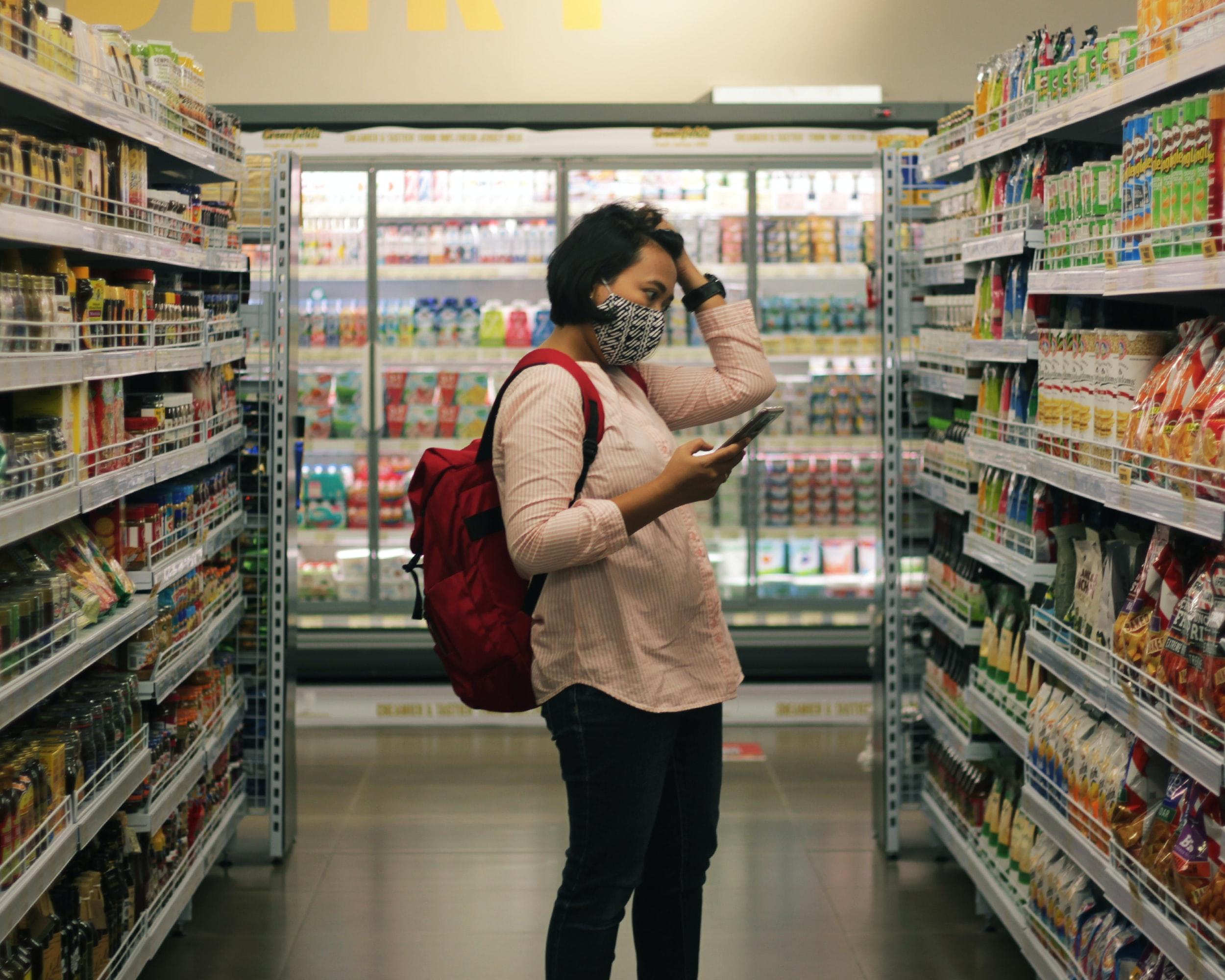 Person grocery shopping stock photo