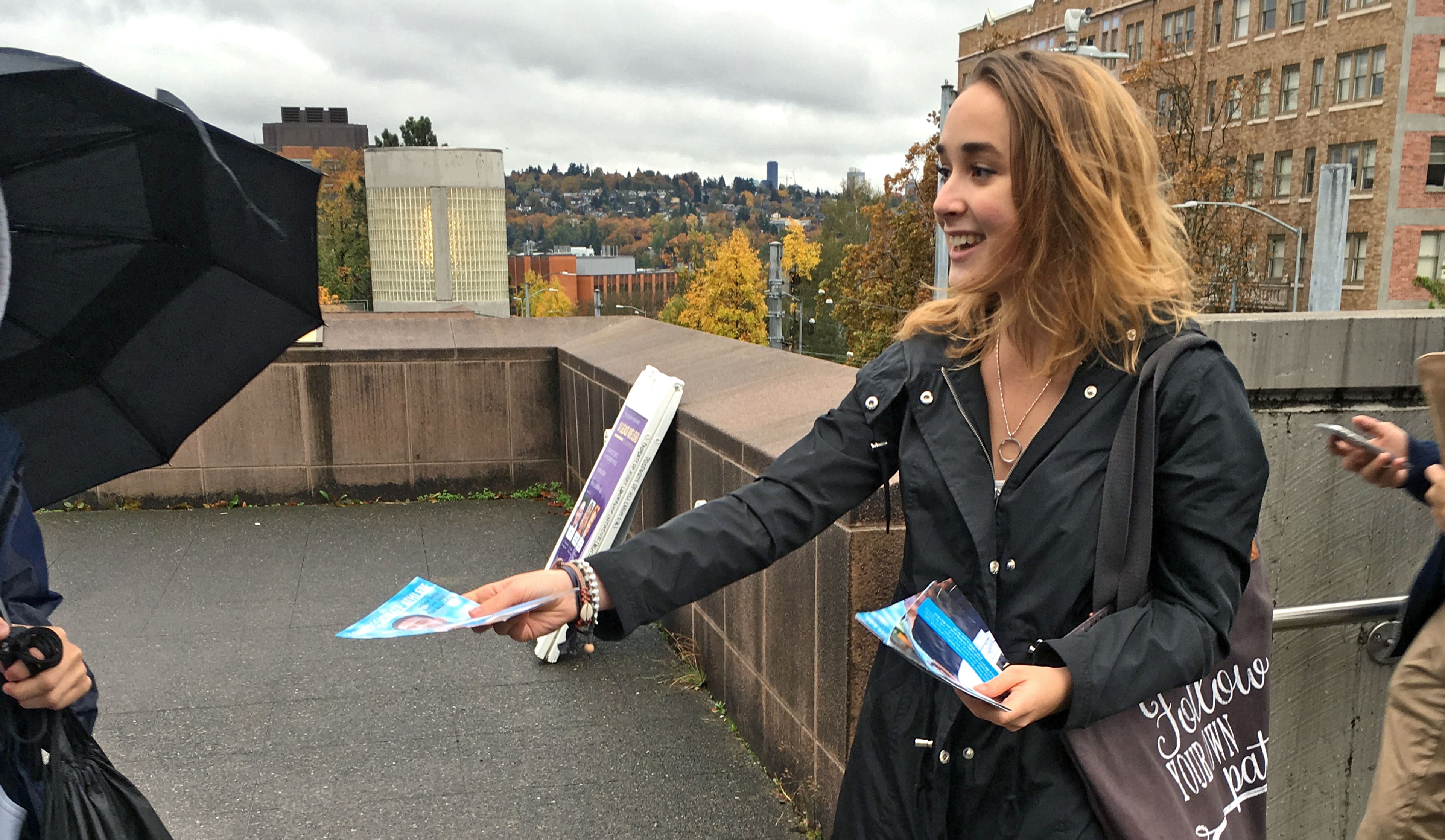 student-outreach-leafleting-outside-activism