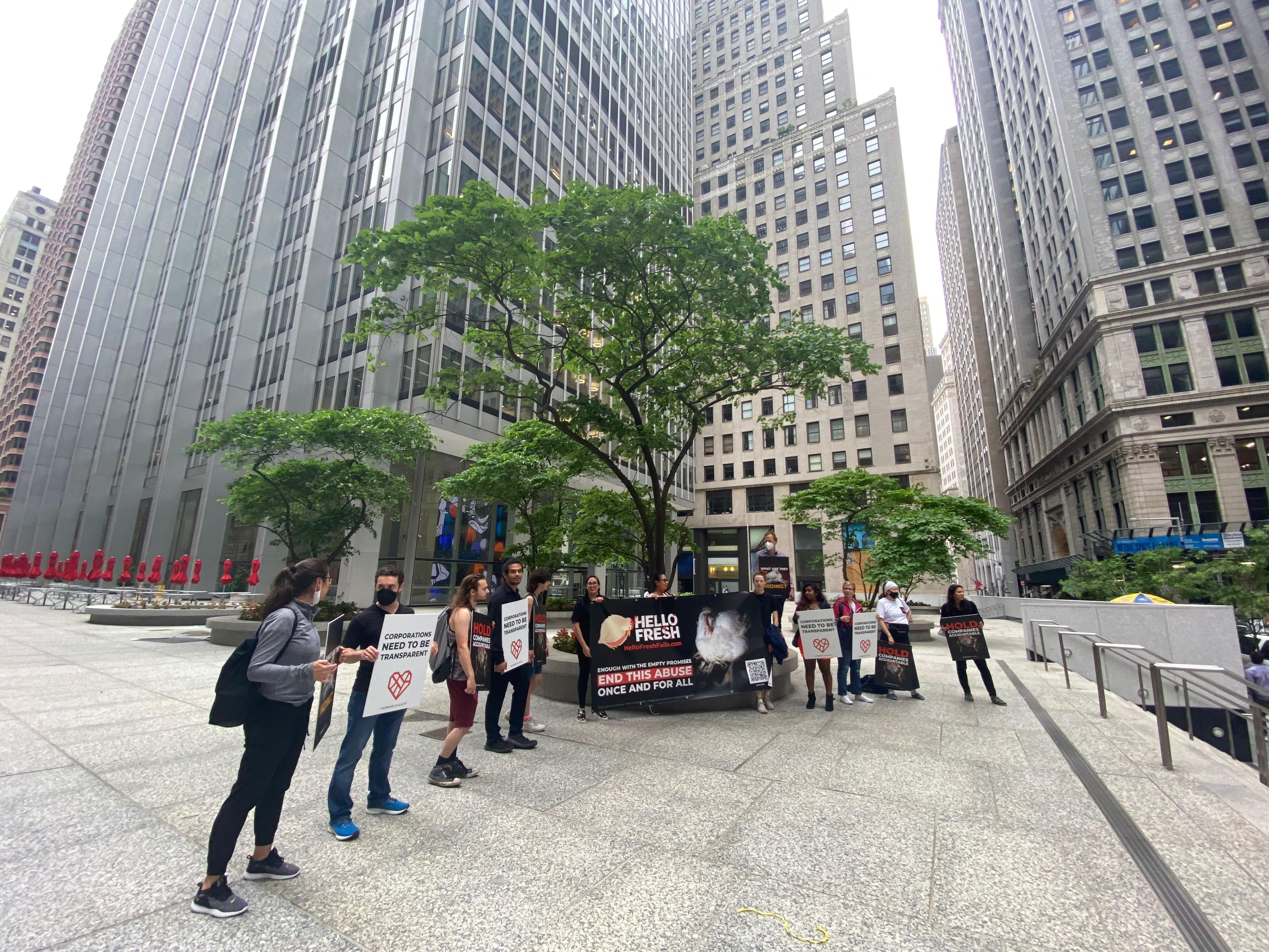 Protesters at at One Chase Manhattan Plaza in New York City, where meal kit company HelloFresh is headquartered on the tenth floor