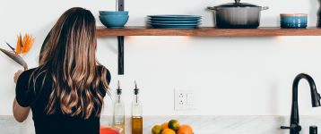 Woman standing in a kitchen