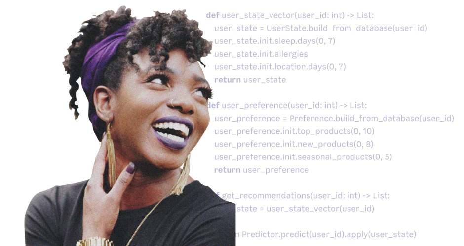 Woman smiling with code in the background