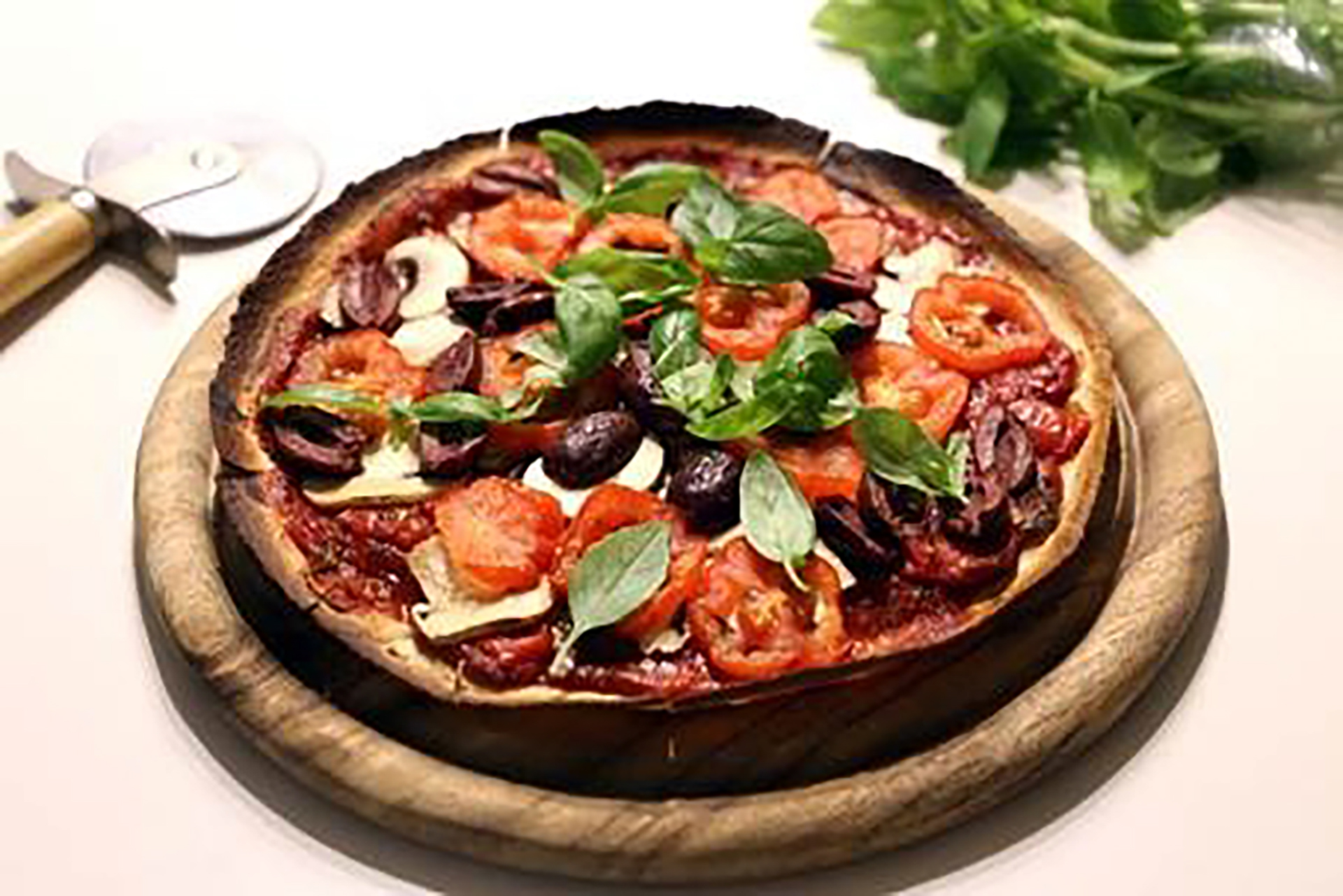 Mushroom and olive pizza with sundried tomato pesto recipe | Live Better