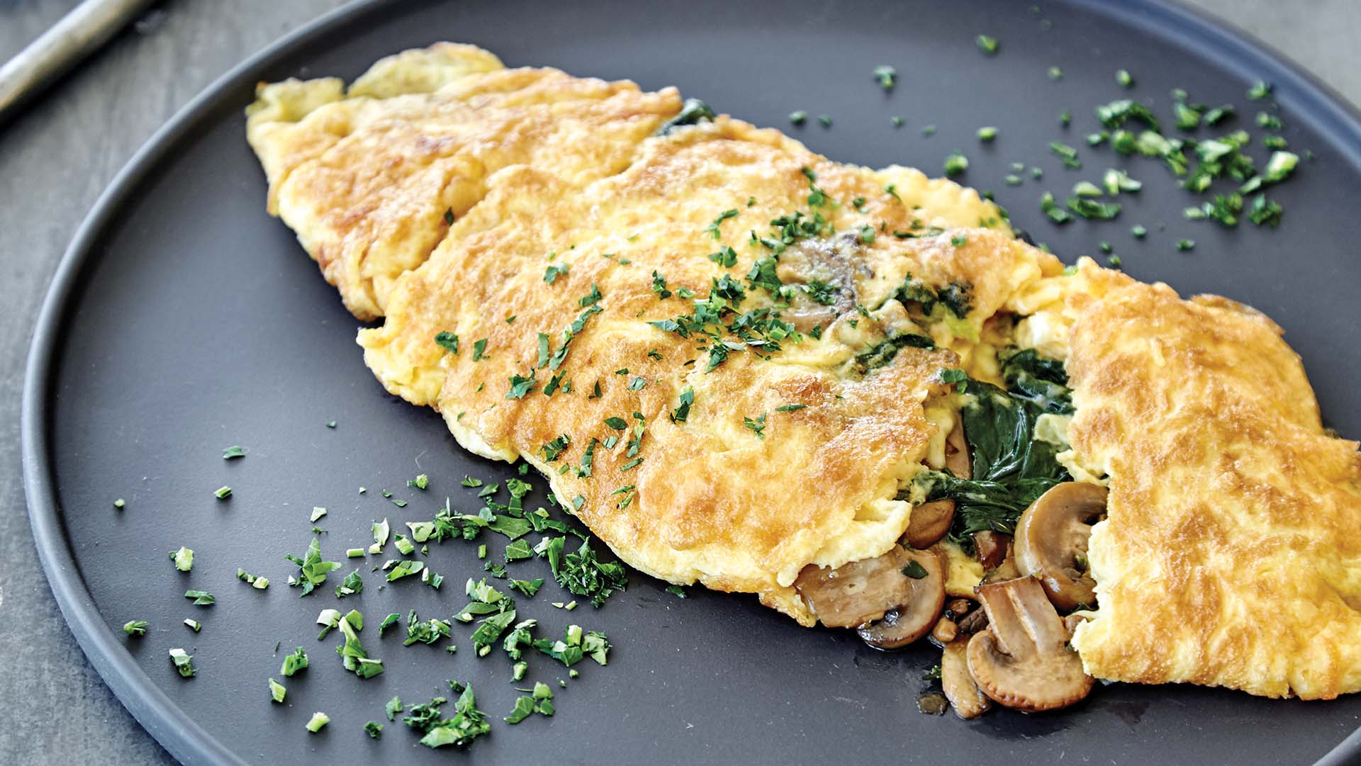 Mushroom omelette with spinach and thyme recipe | Live Better