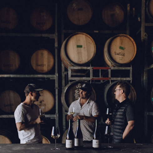 Three men drinking wine The Marlborist