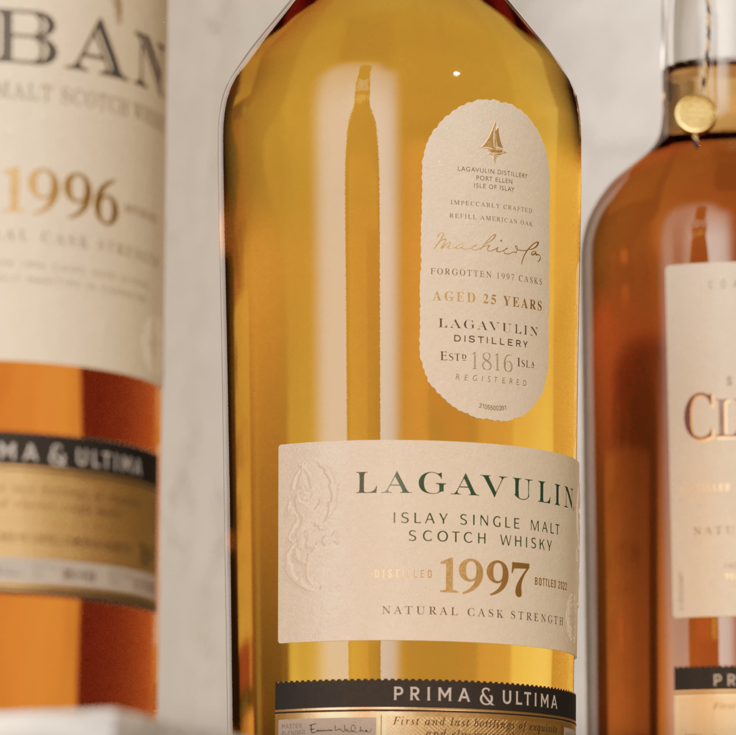 A bottle of Lagavulin 1997 beside two other whisky bottles