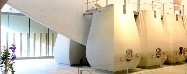 big white egg shaped vats in minimalist room