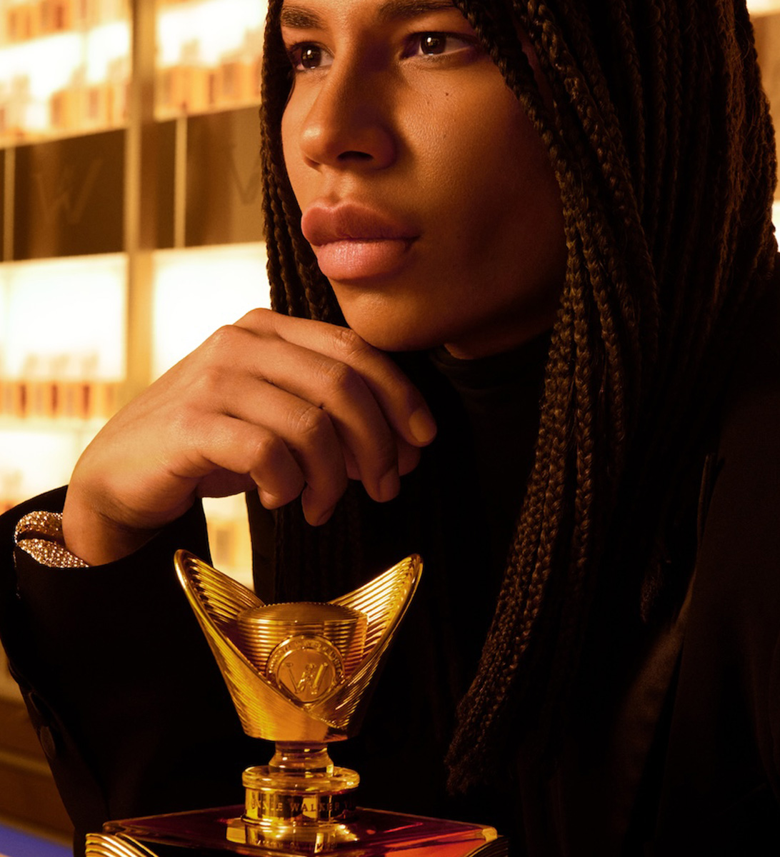 Olivier Rousteing holding a Couture Expression: Fall bottle in Johnnie Walker Vault