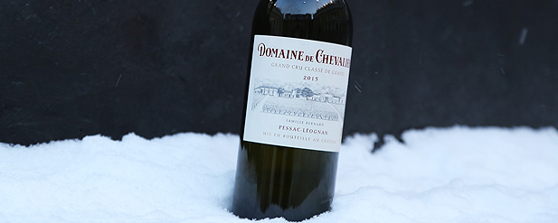 bottle of wine in the snow