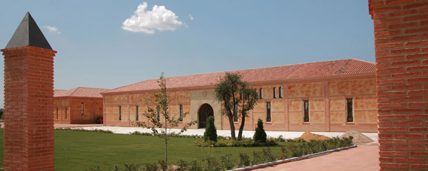 sunny exterior of red brick building