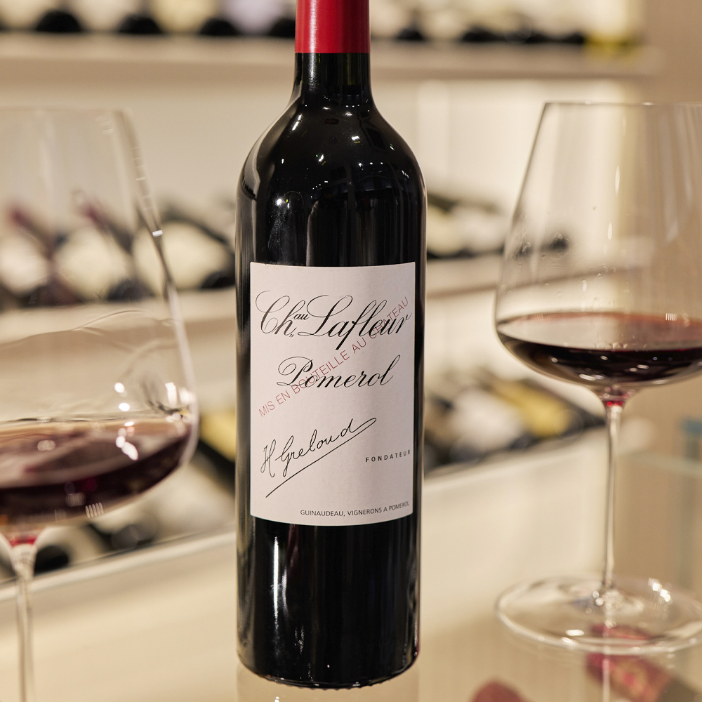 two glasses and bottle of claret