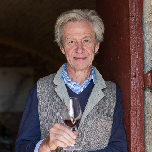 Man holding a glass of wine, Marquis d’Angerville
