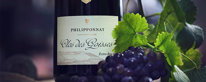 Philipponnat’s Clos des Goisses bottle with a grapes