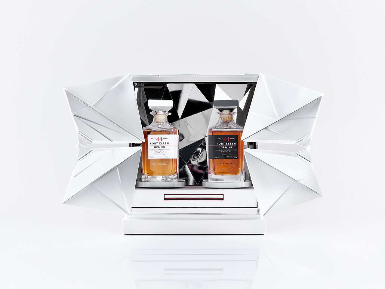two bottles of gemini port ellen whisky in a futuristic white case