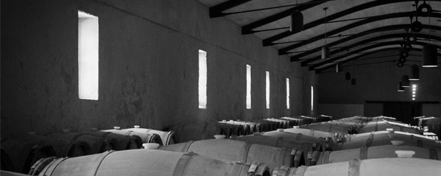 black and white barrels in a tunnel