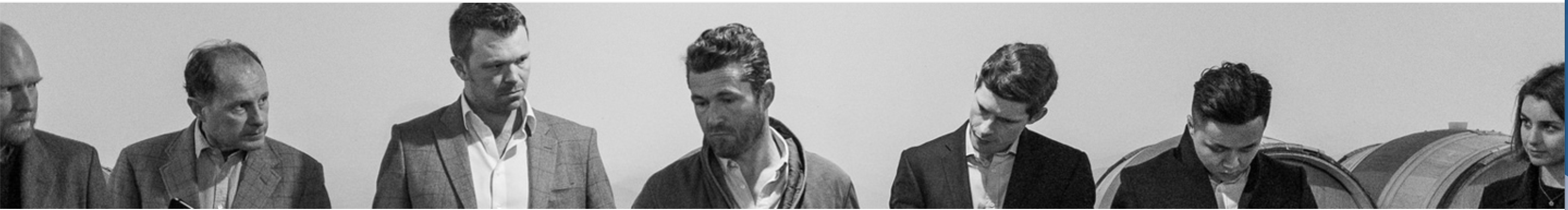 Black and white image of men in suits